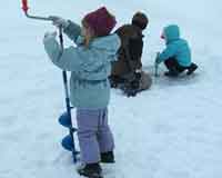 Young people ice fishing